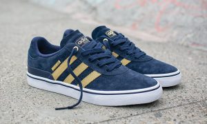 Adidas Busenitz adidas skateboarding dresses the busenitz vulc in blue and gold for 10-year  anniversary PQCJUHE