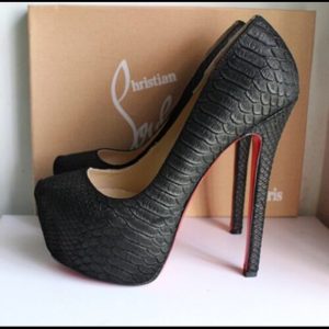 louis vuitton shoes - a pair or red bottom heels. YITLNEP