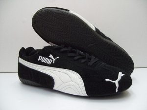 the puma speed cat in itu0027s most common color scheme, blacku0026white SCMSTAO